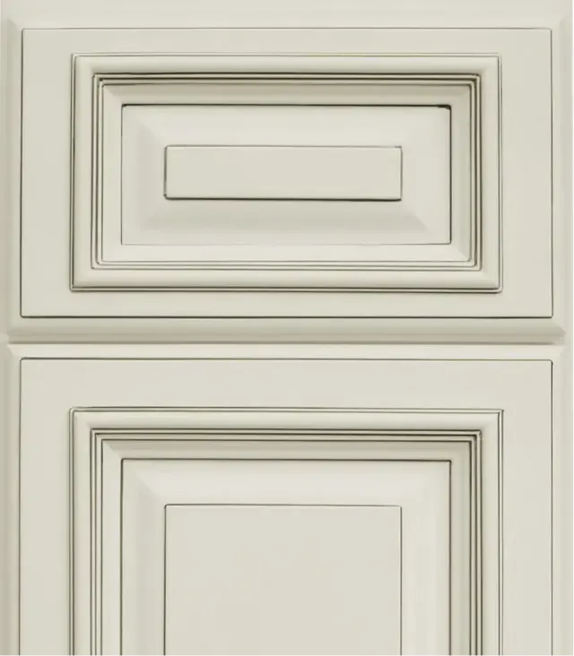 Two beige cabinet doors with raised panel designs and recessed rectangular details.